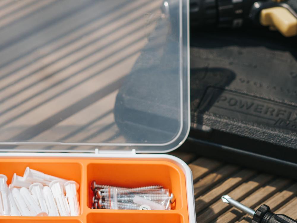 Toolkit with a drill and screws