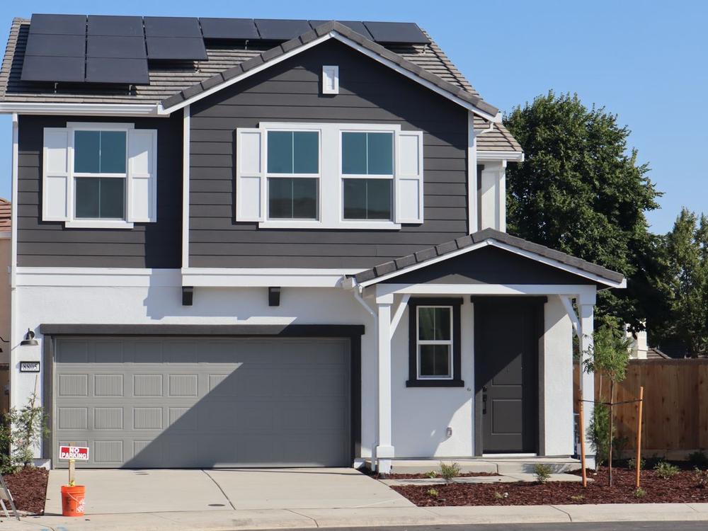 Clean two-story home after a house wash